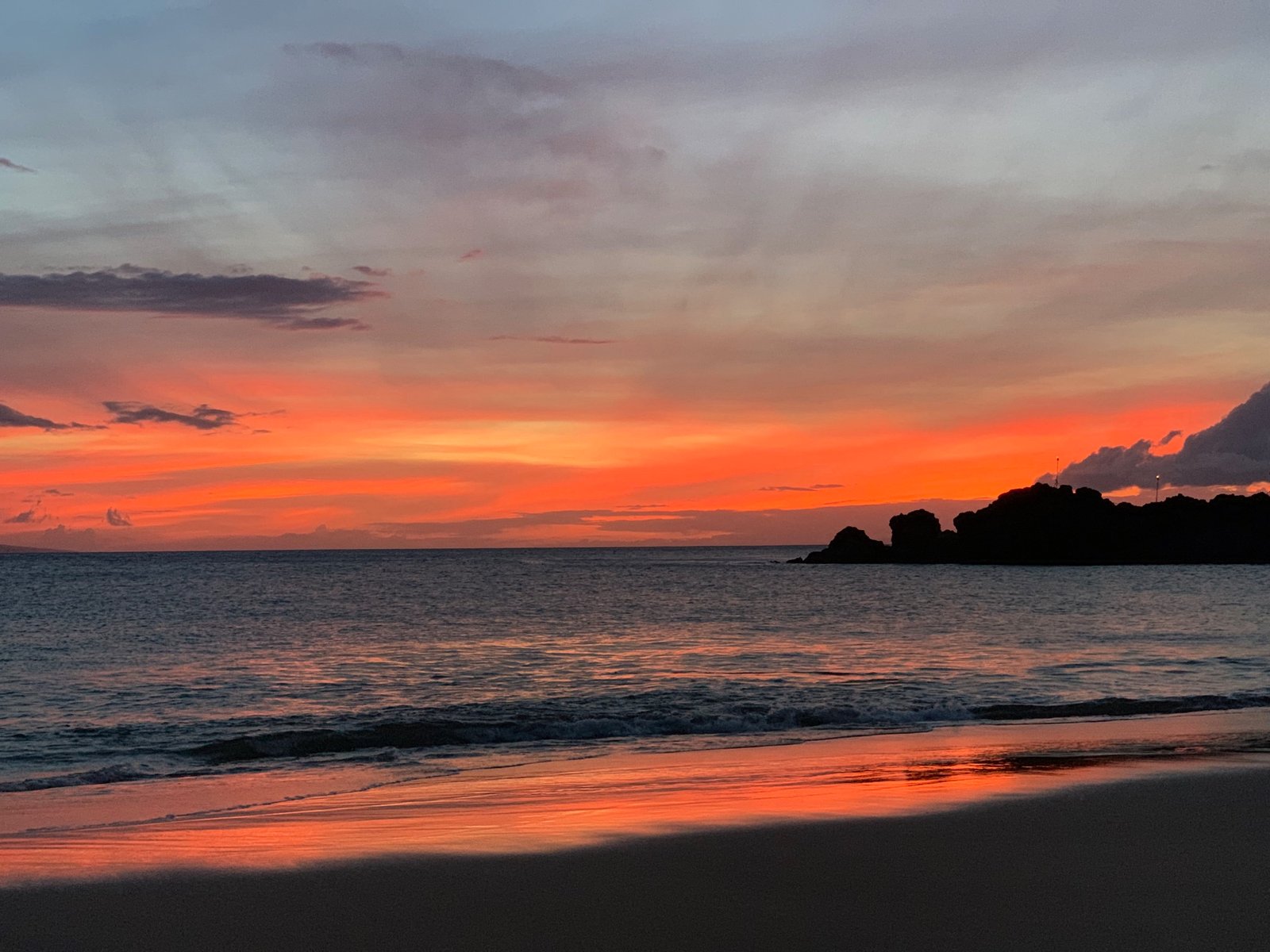 Coastal silhouette at sunset